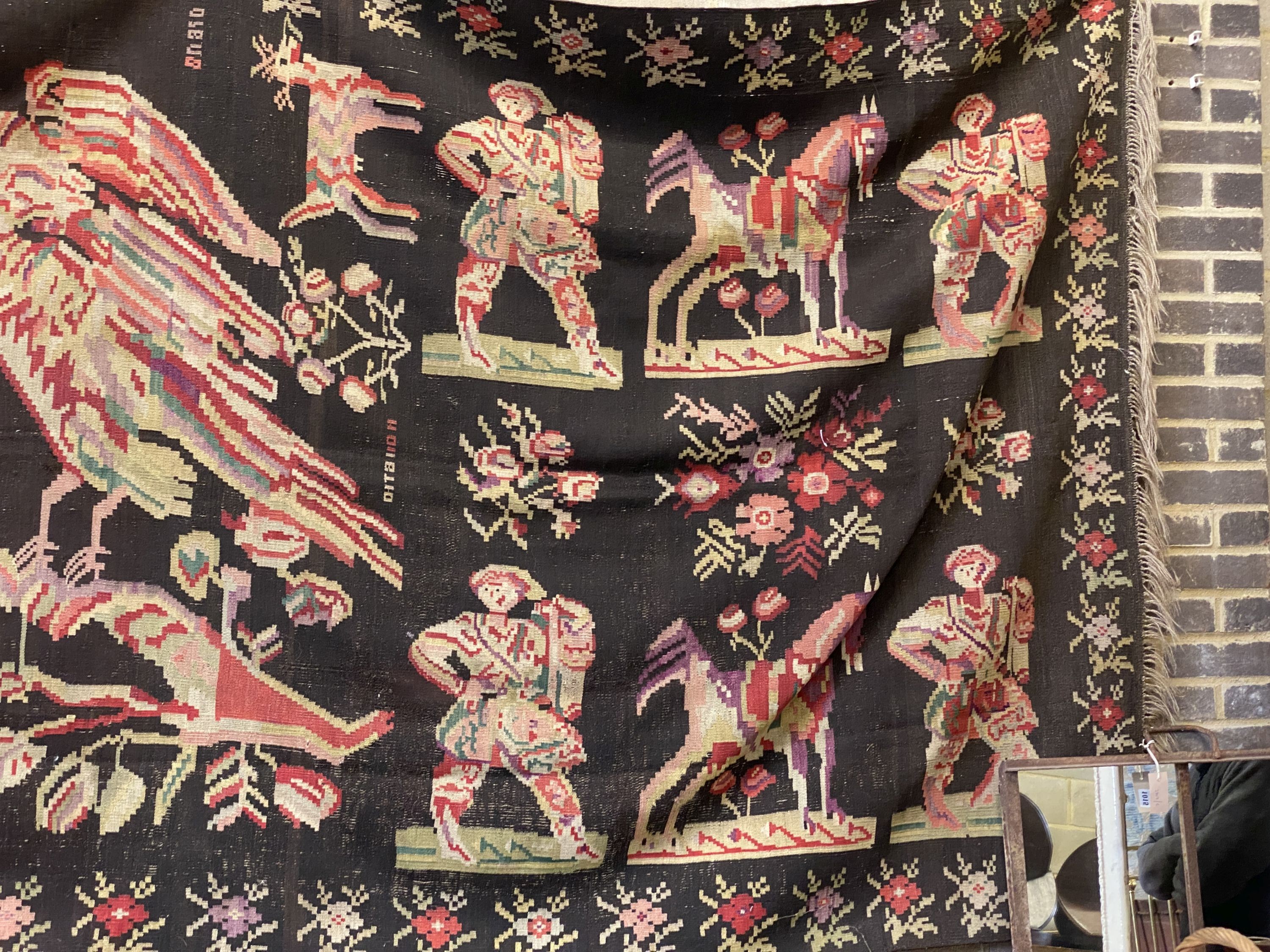 An antique Besbarabiam Kelim flatweave carpet woven with figures and birds, approx. 350 x 170cm